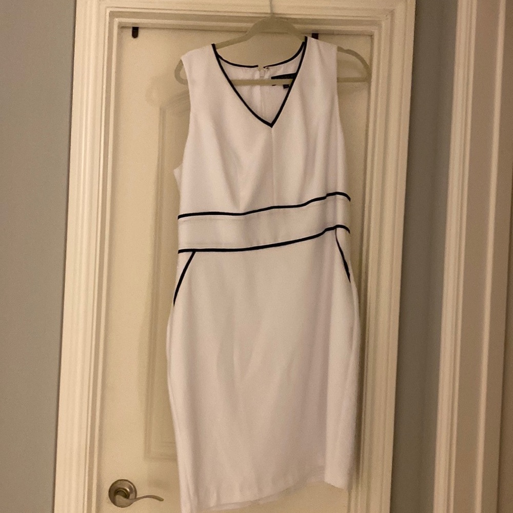 White dress with black lining